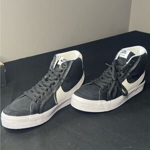 Nike Black and White Mid-Top Sneakers with White Swoosh